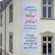 BA23 - Leichtes, bedrucktes Gewebebanner direkt auf der Fassade montiert.