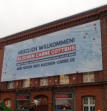 BA01 - Bedrucktes Vinylgewebe-Werbebanner am Blechen carre Cottbus.